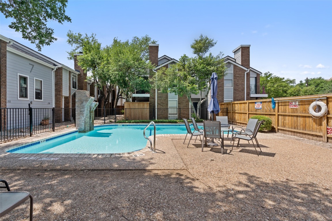 7635 Guadalupe Street, Unit 102 Austin, TX 78752 - Photo 32 of 36 a view of a backyard with a patio
