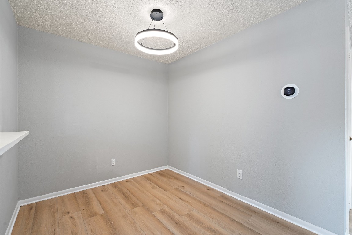 7635 Guadalupe Street, Unit 102 Austin, TX 78752 - Photo 6 of 36 a view of an empty room