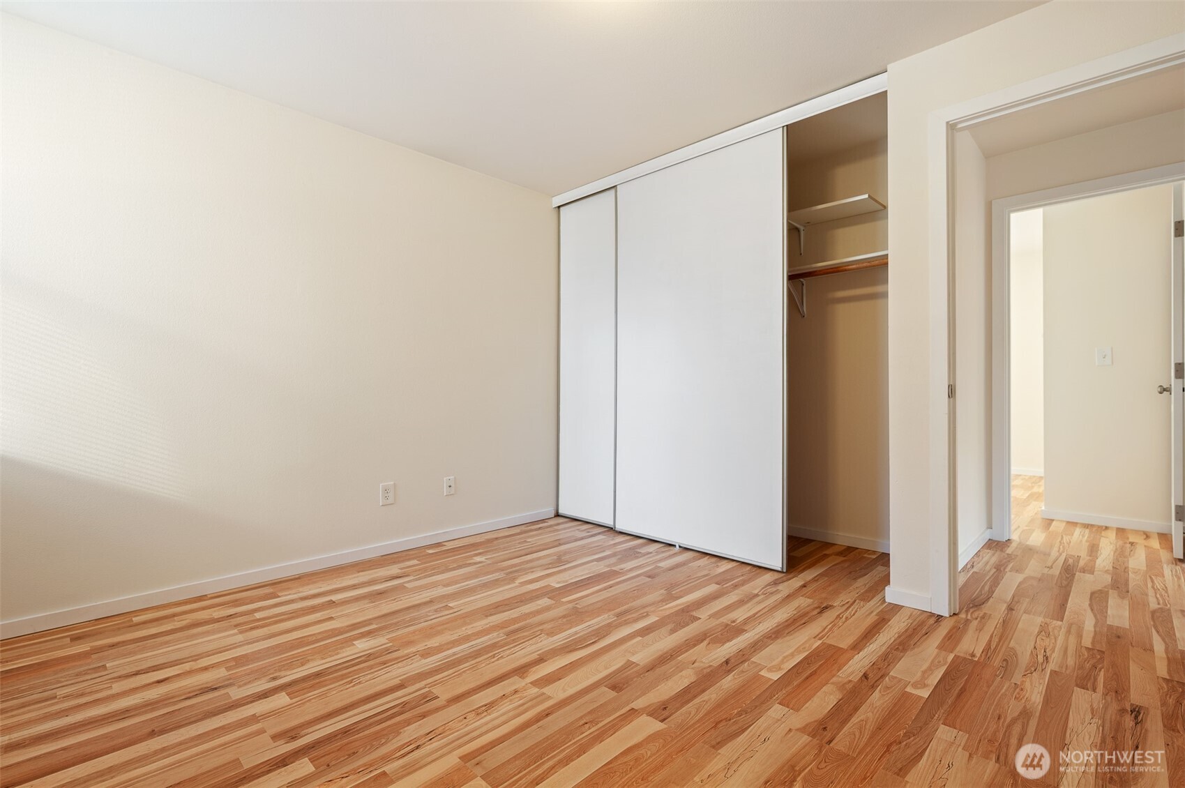 802 North 43rd Street Seattle, WA 98103 - Photo 18 of 18 a view of empty room with wooden floor