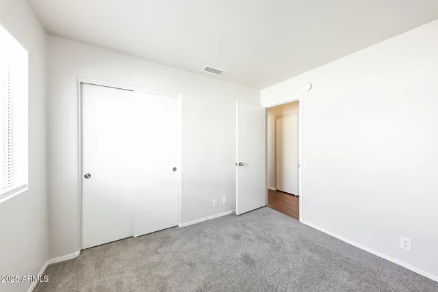 a bathroom with a bathtub shower sink and a toilet