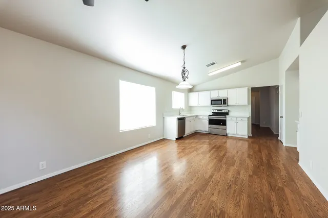a picture of a bathroom with a shower