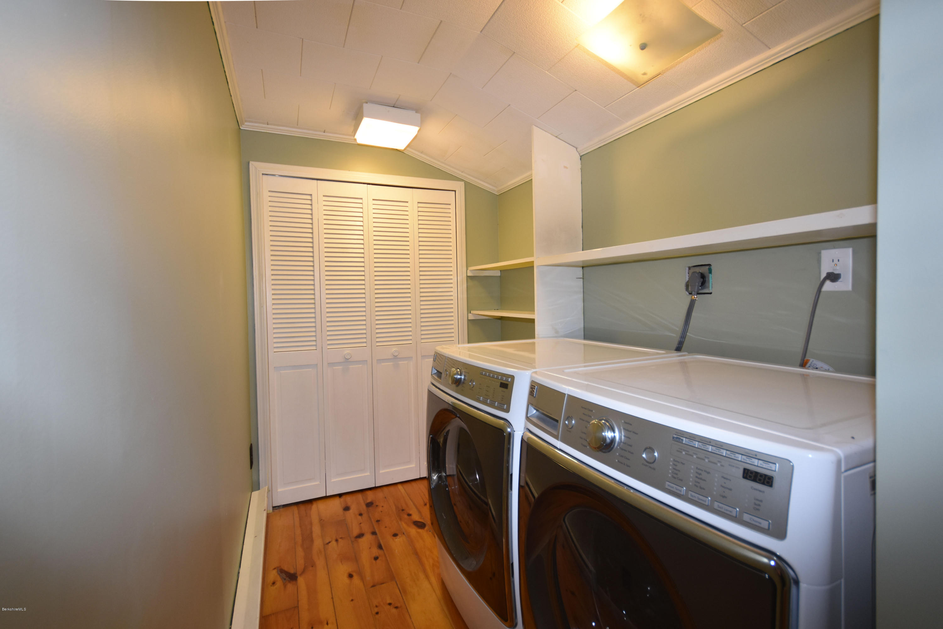 834 George Carter Road Becket, MA 01223 - Photo 34 of 61 a utility room with dryer and washer