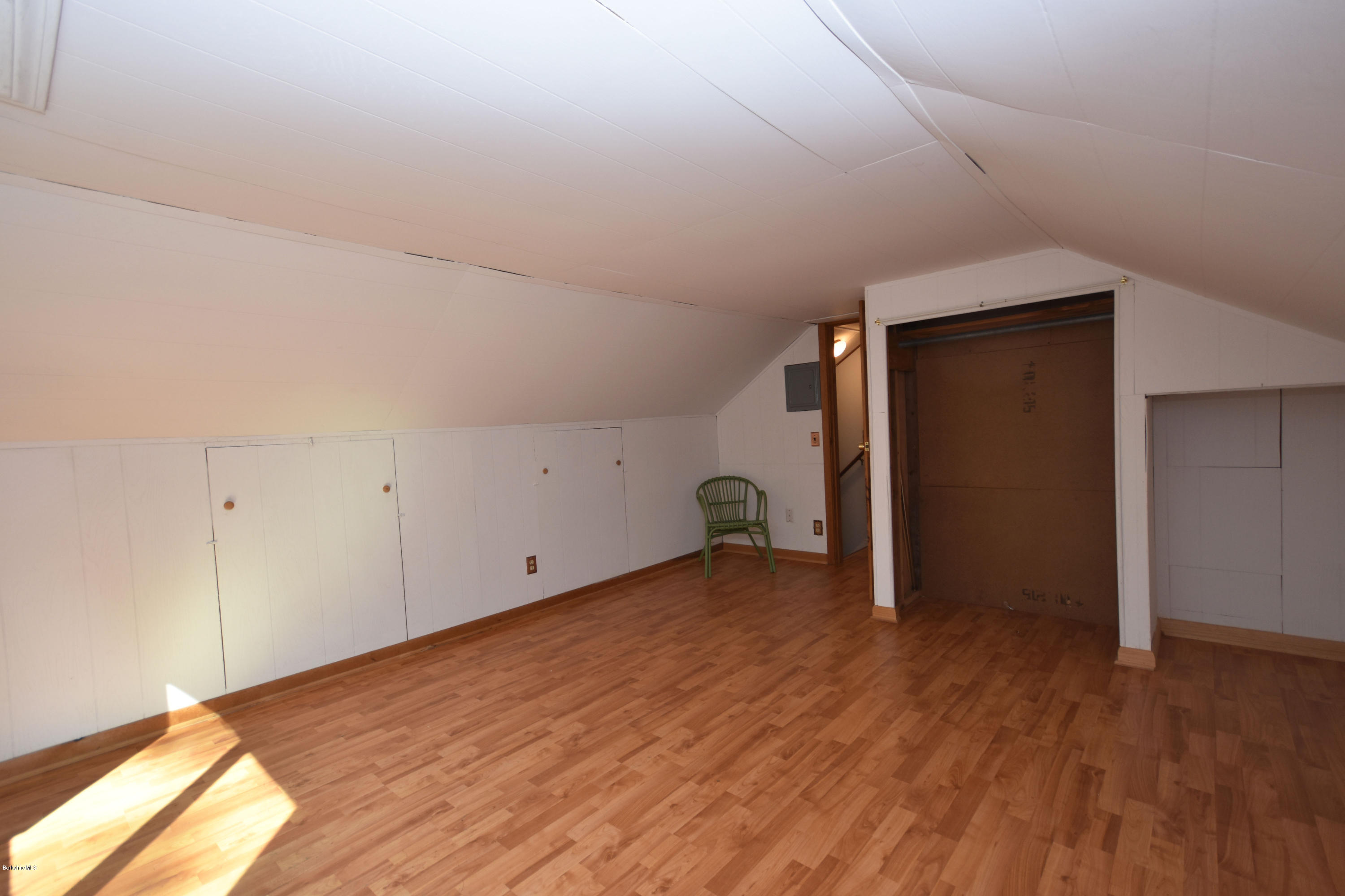 834 George Carter Road Becket, MA 01223 - Photo 39 of 61 a view of empty room with wooden floor