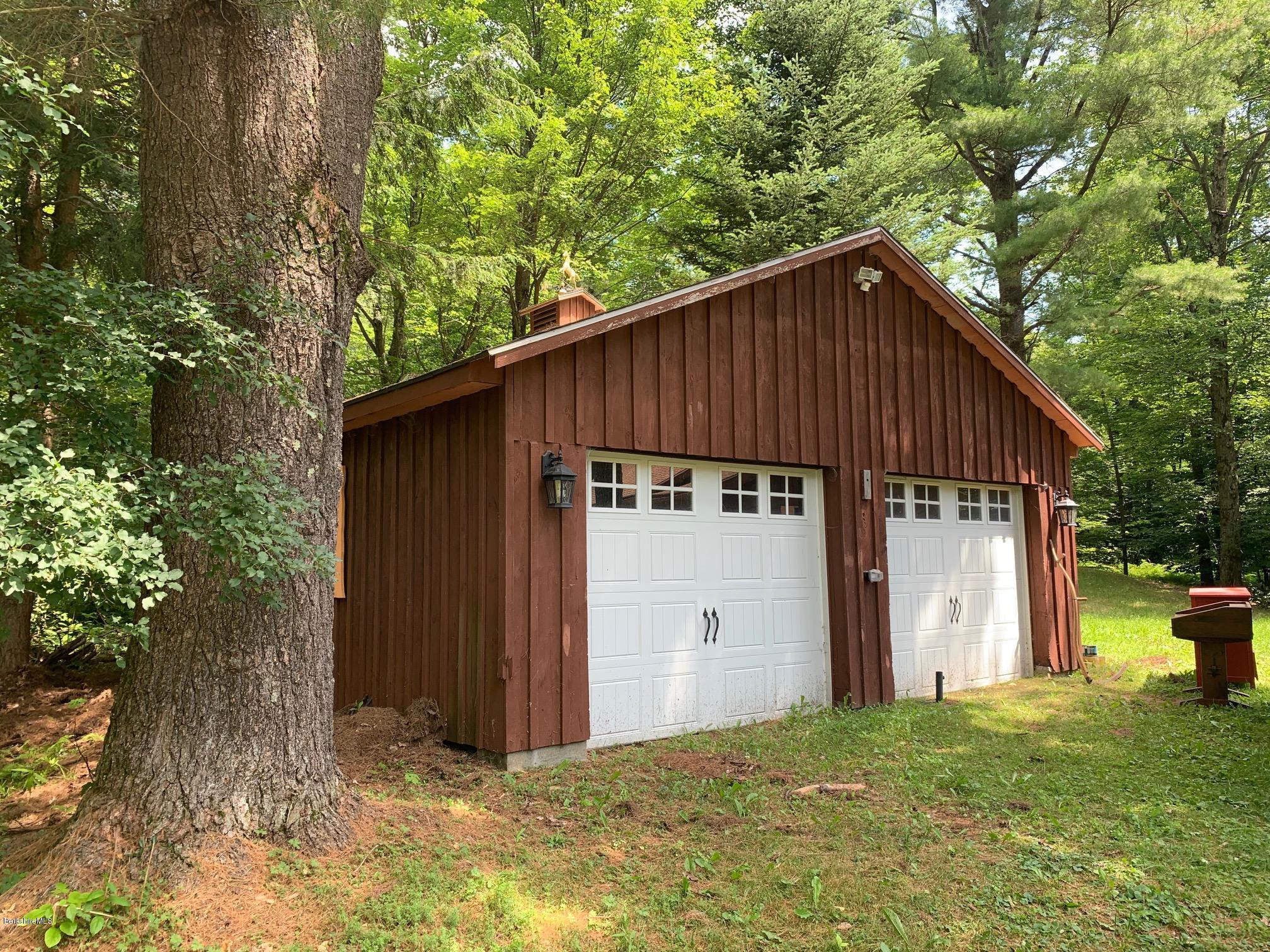 834 George Carter Road Becket, MA 01223 - Photo 60 of 61 a view of a small house