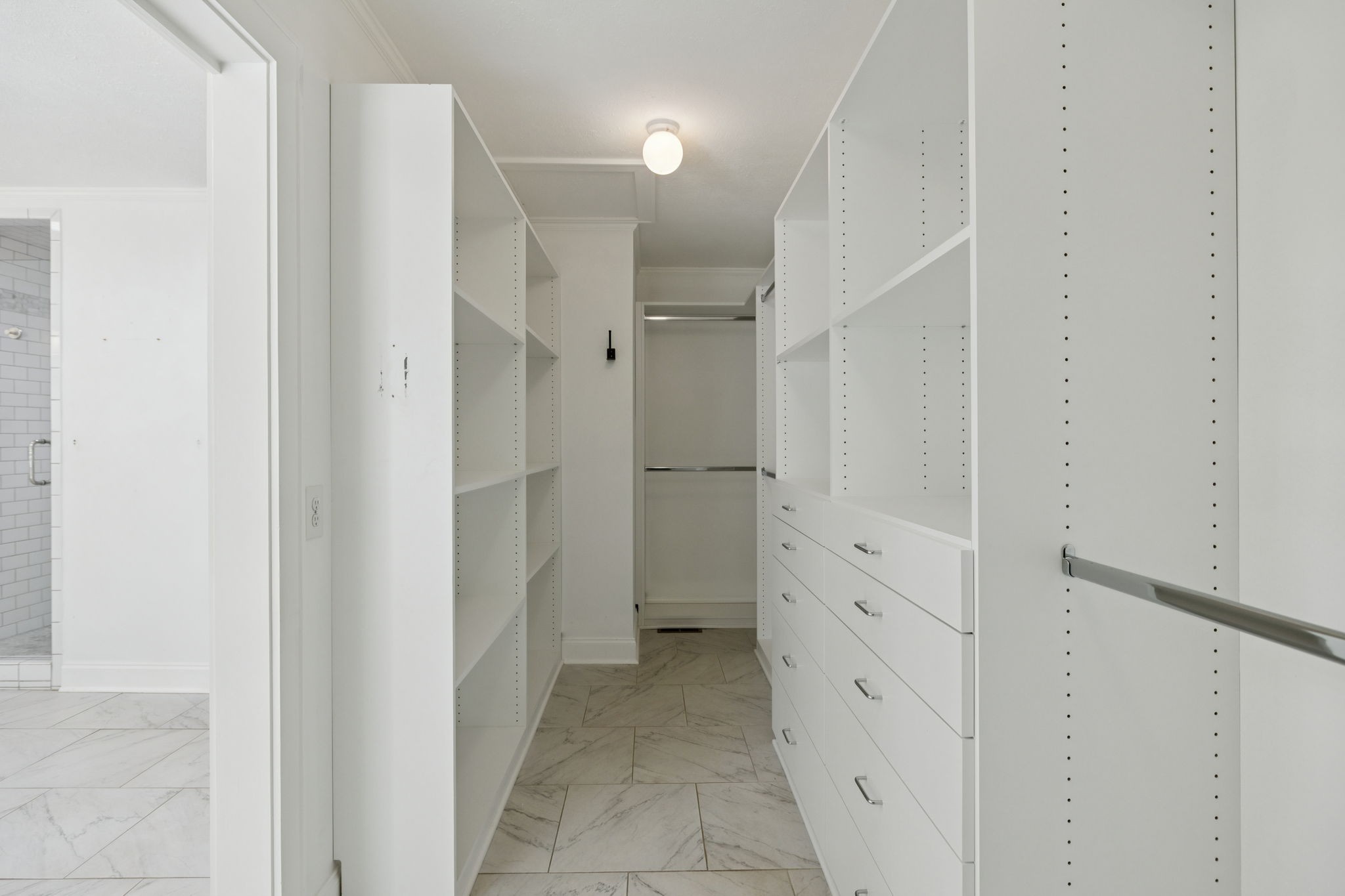 527 East Madison Street Pulaski, TN 38478 - Photo 35 of 74 a bathroom with a shower and a sink