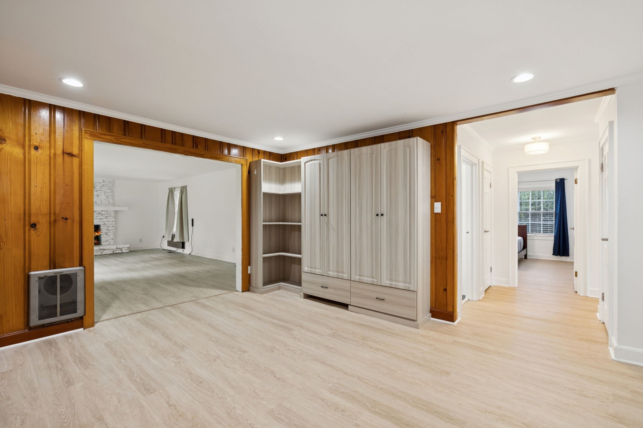 527 East Madison Street Pulaski, TN 38478 - Photo 45 of 74 a view of a livingroom with wooden floor and a bathroom