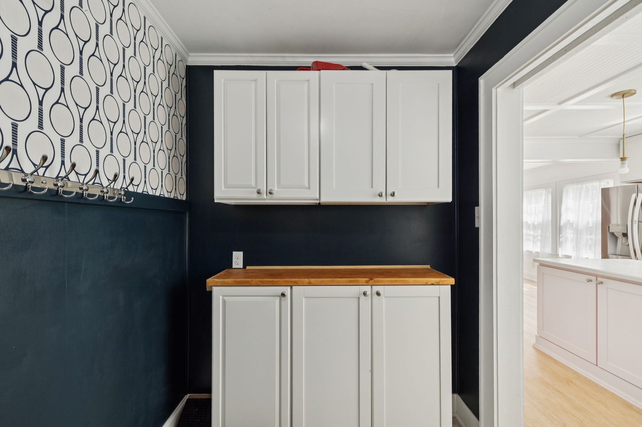 527 East Madison Street Pulaski, TN 38478 - Photo 50 of 74 a view of washer and dryer with kitchen in the background