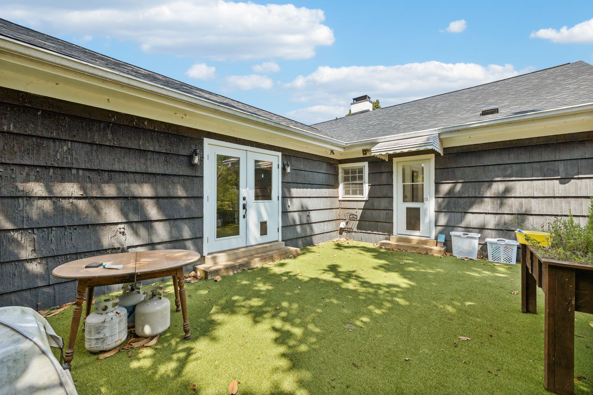527 East Madison Street Pulaski, TN 38478 - Photo 63 of 74 a view of an house with backyard porch and patio