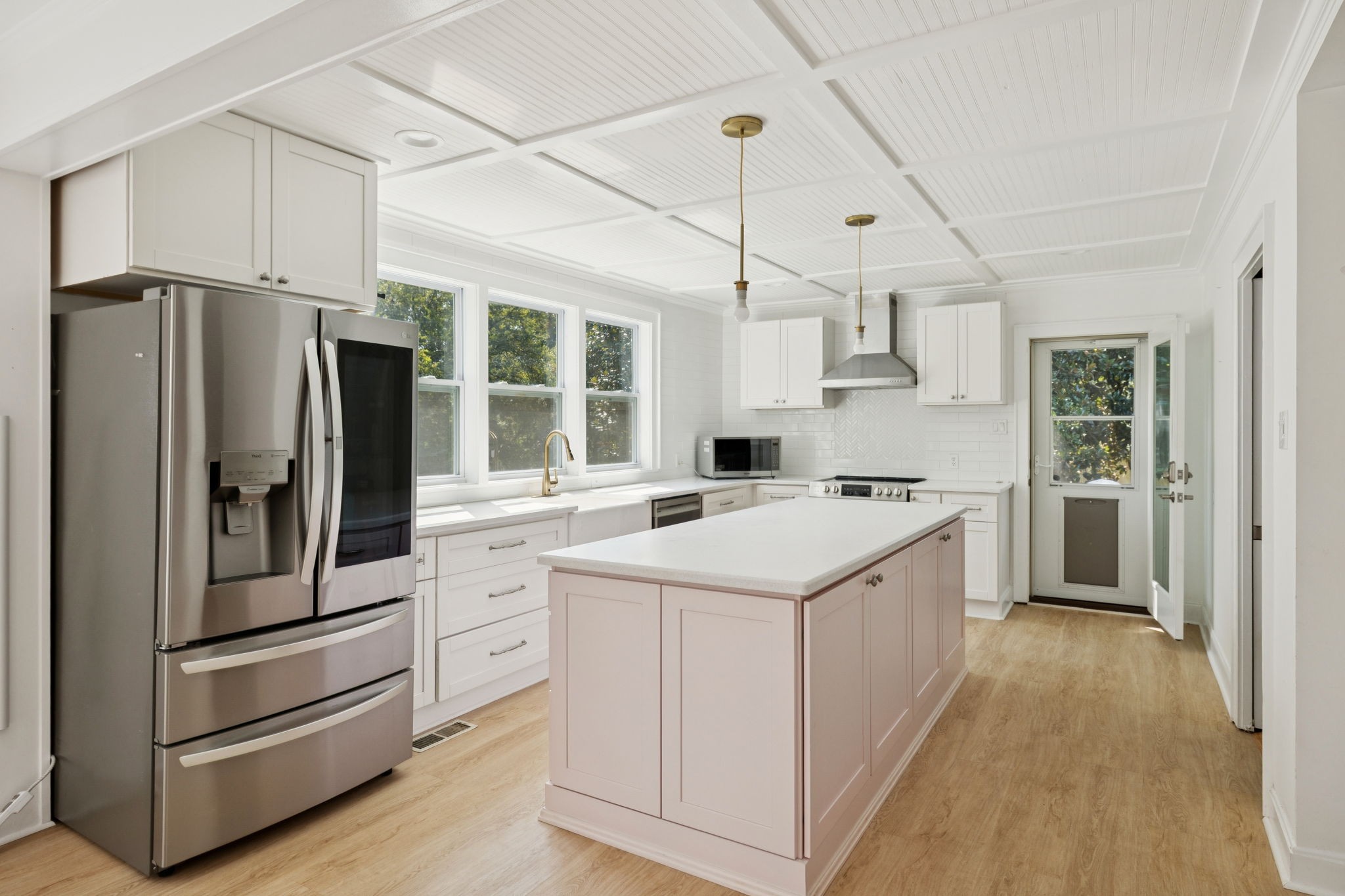 527 East Madison Street Pulaski, TN 38478 - Photo 8 of 74 a kitchen with a refrigerator sink and cabinets