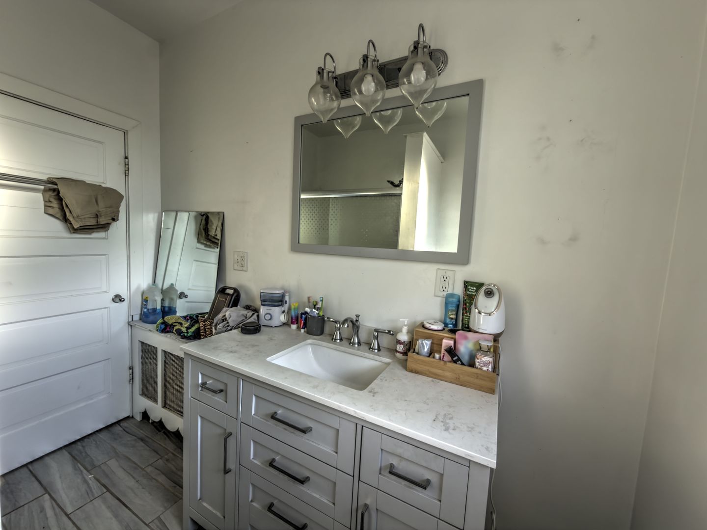 533 South 4th Street Watseka, IL 60970 - Photo 15 of 24 a bathroom with a sink and a mirror