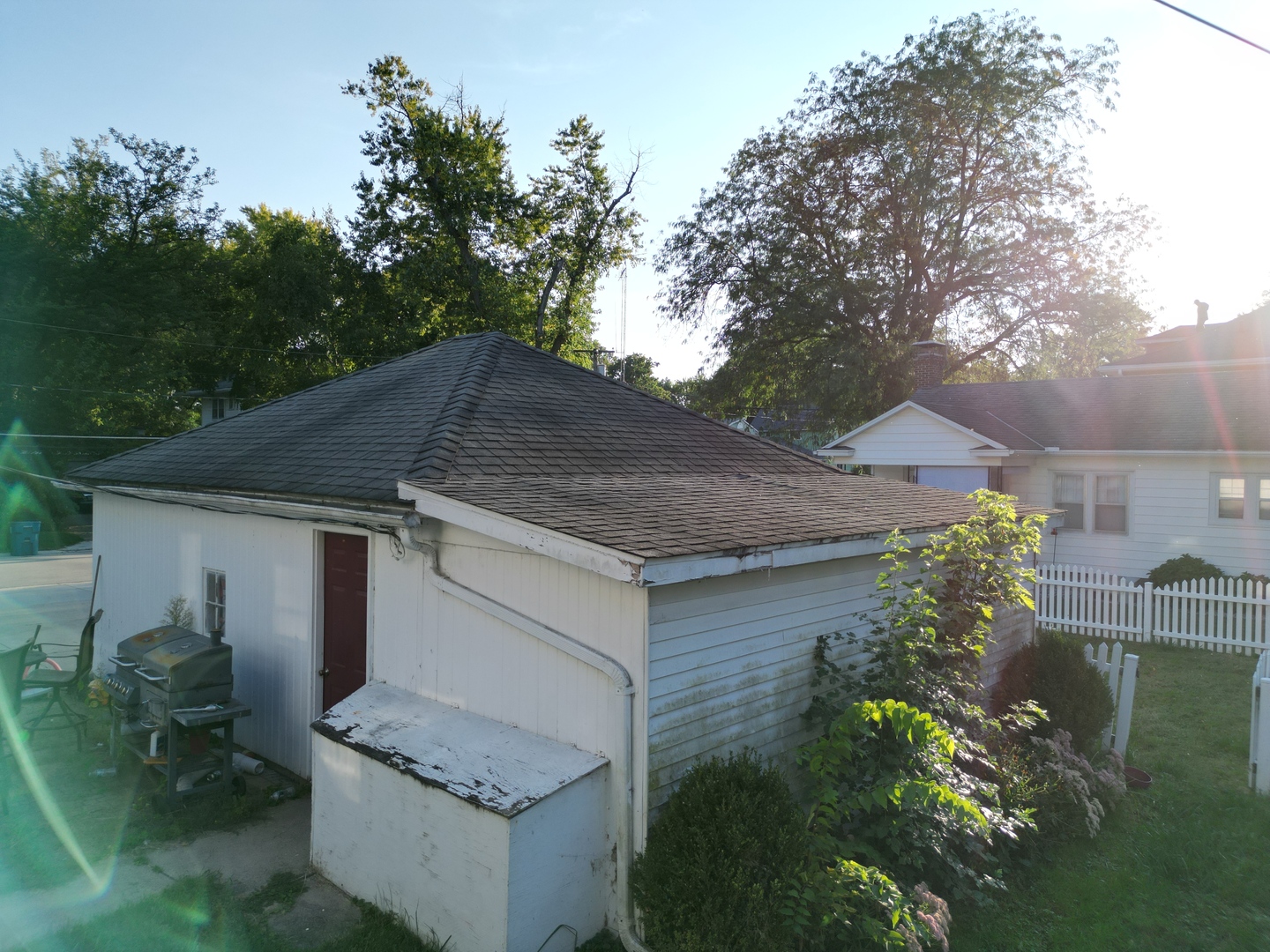 533 South 4th Street Watseka, IL 60970 - Photo 7 of 24 a aerial view of a house with a yard and potted plants