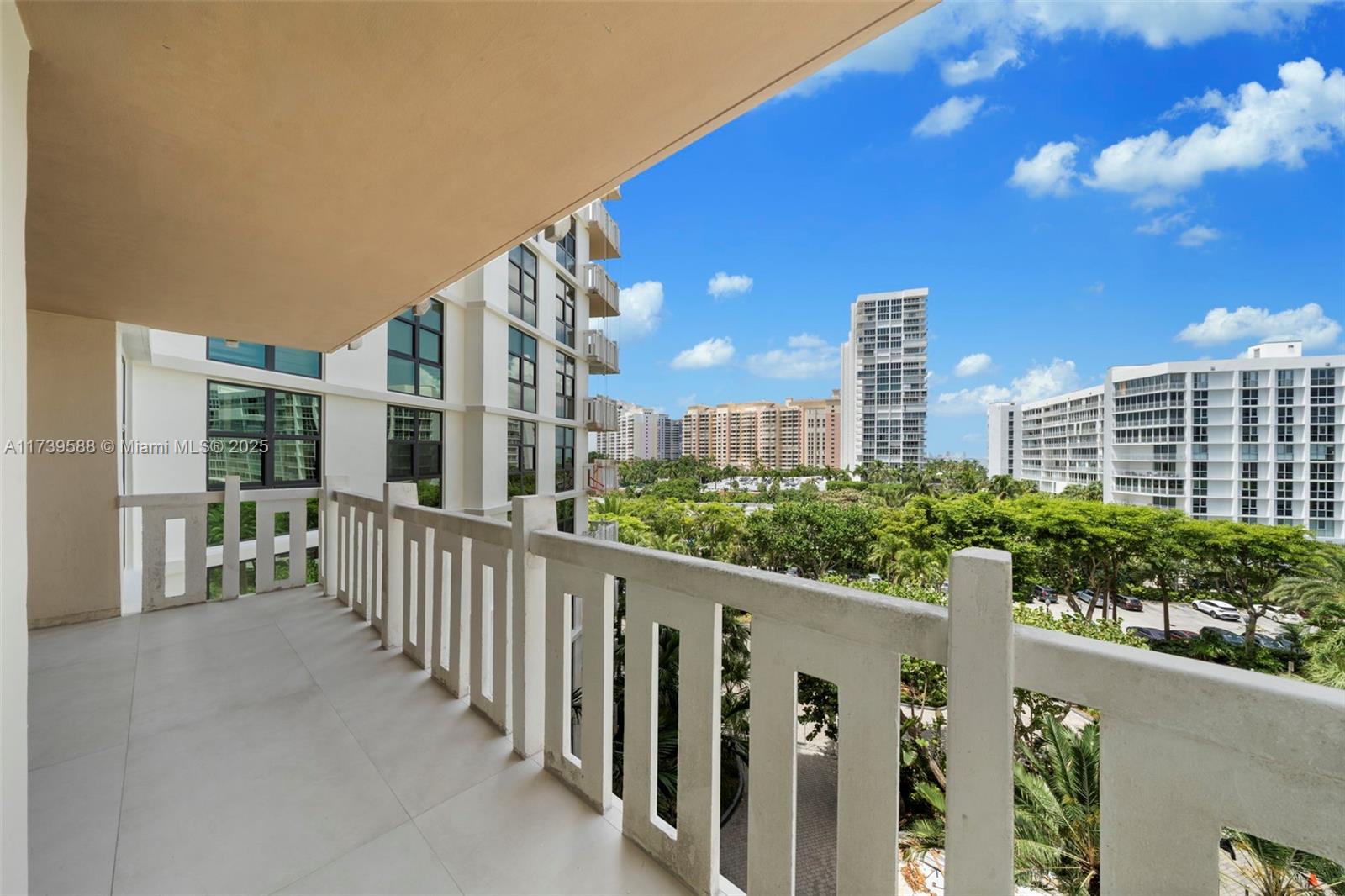 1121 Crandon Boulevard, Unit E503 Key Biscayne, FL 33149 - Photo 13 of 29 a view of a city from a balcony