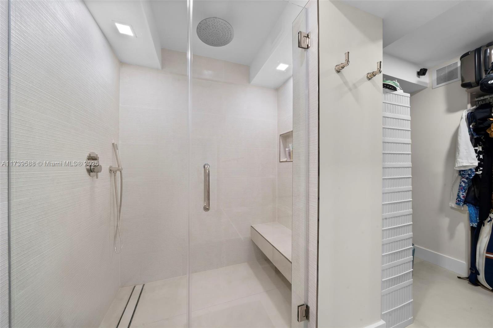 1121 Crandon Boulevard, Unit E503 Key Biscayne, FL 33149 - Photo 9 of 29 a bathroom with a shower and a sink