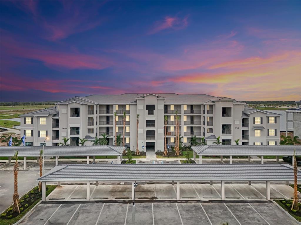 a front view of a building with street view