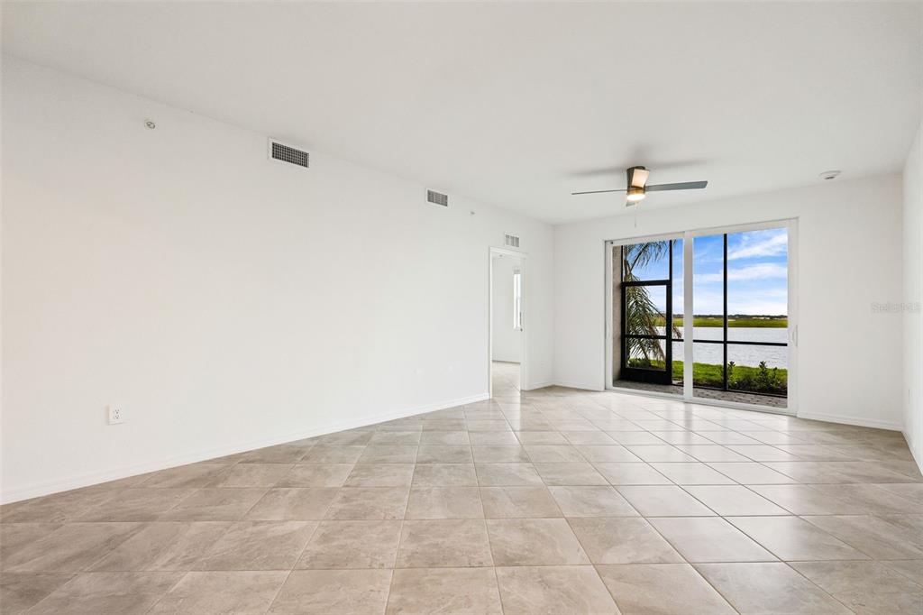 19140 Scallop Loop, Unit 105 Lakewood Ranch, FL 34211 - Photo 11 of 37 a view of an empty room with a window