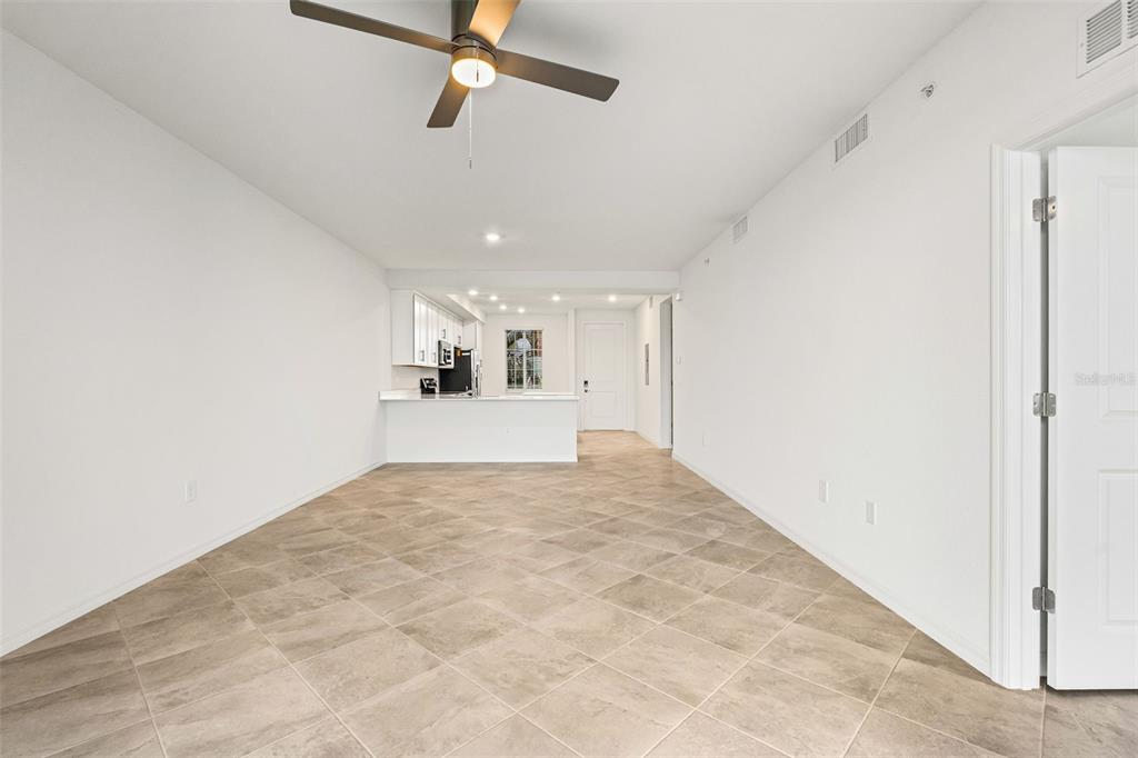19140 Scallop Loop, Unit 105 Lakewood Ranch, FL 34211 - Photo 13 of 37 a view of a kitchen with a sink and cabinets