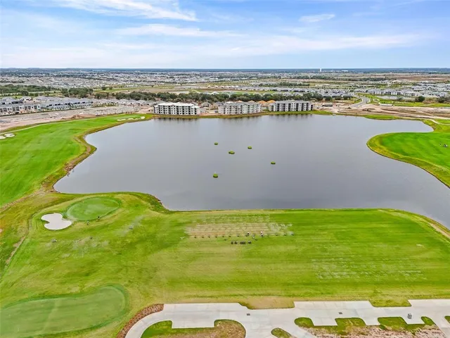a view of a city with an ocean view