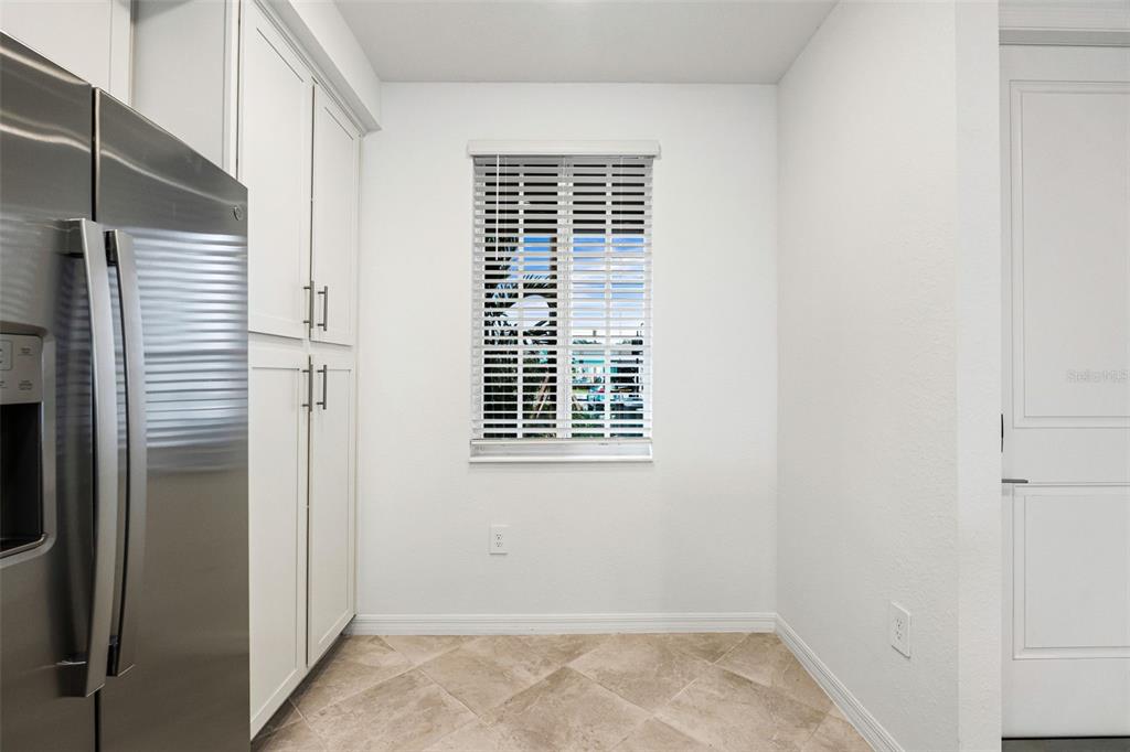 19140 Scallop Loop, Unit 105 Lakewood Ranch, FL 34211 - Photo 6 of 37 a view of a room that has a window in it