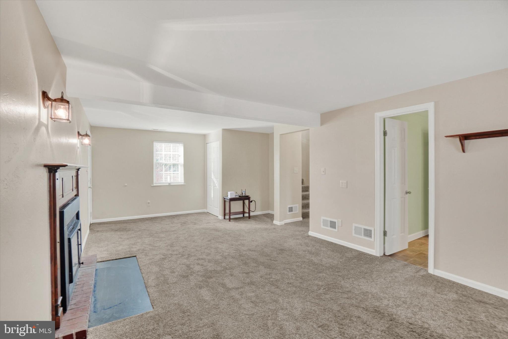 2270 Seneca Drive York, PA 17408 - Photo 20 of 28 an empty room with windows and bathroom view