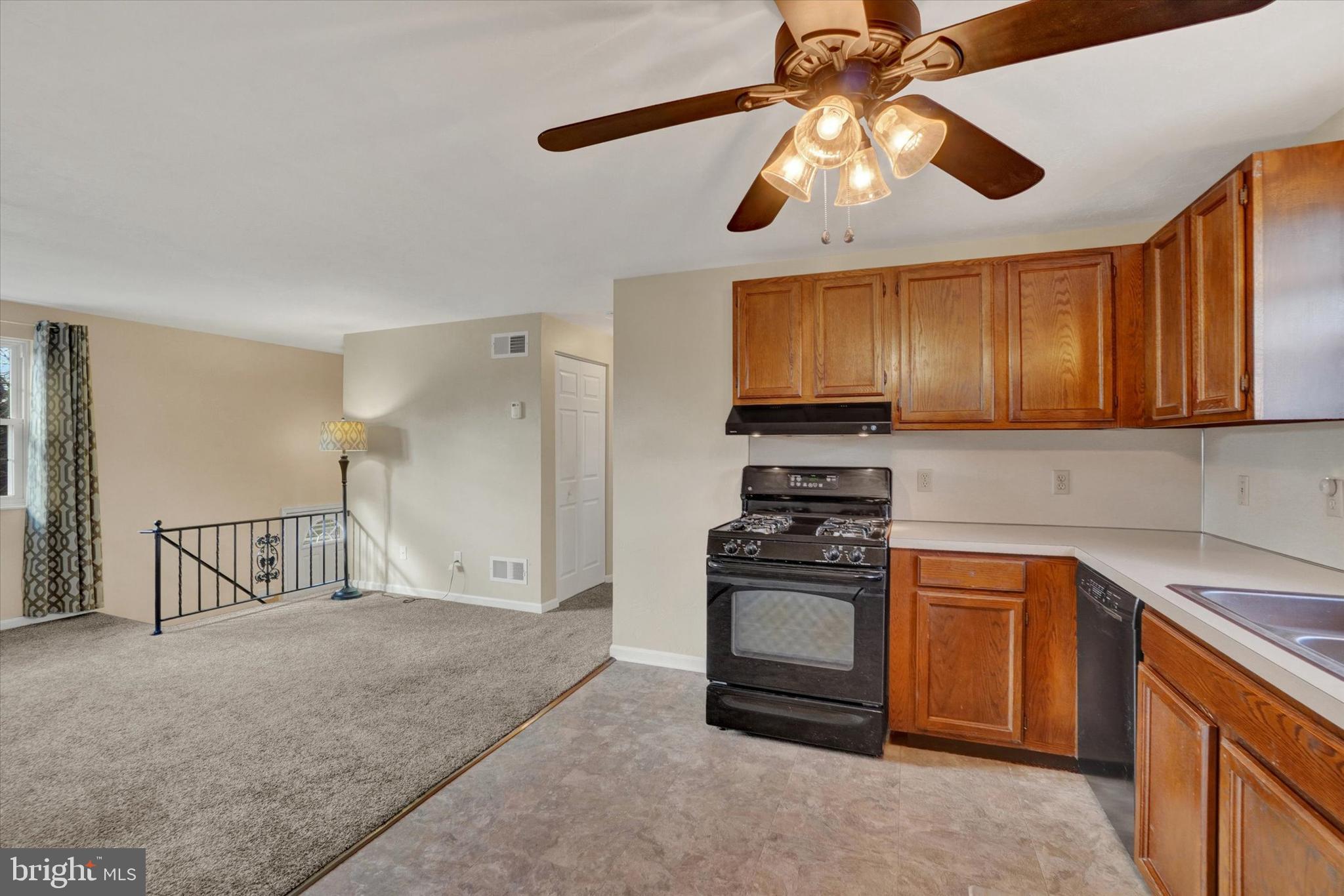 2270 Seneca Drive York, PA 17408 - Photo 10 of 28 a kitchen with stainless steel appliances granite countertop wooden cabinets a stove a sink and dishwasher