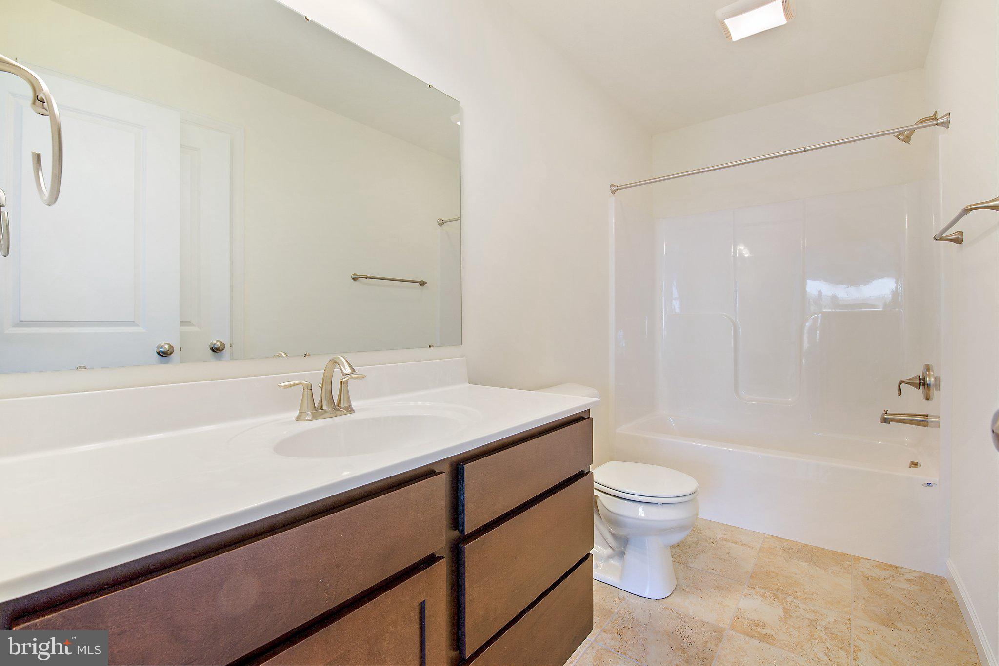 53 Bright Lane Hanover, PA 17331 - Photo 20 of 21 a bathroom with a sink a toilet and shower