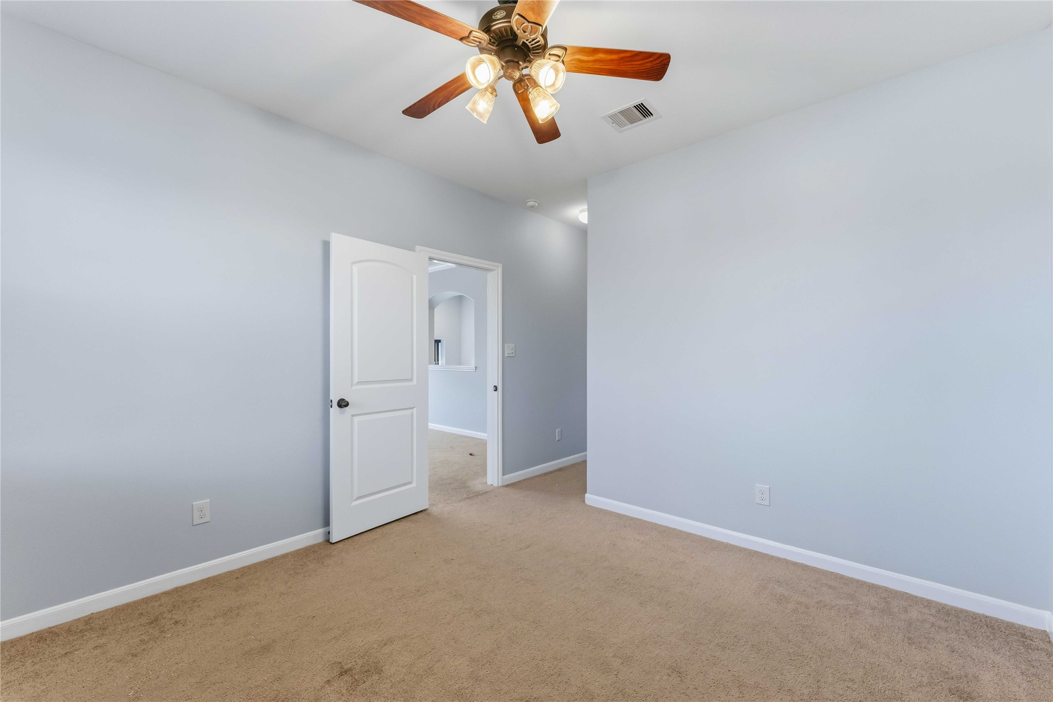 25327 Oak Knot Drive Spring, TX 77389 - Photo 24 of 32 an empty room with chandelier fan