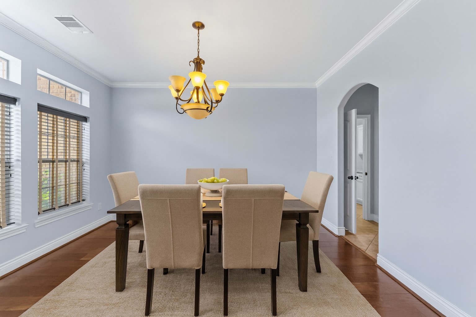 25327 Oak Knot Drive Spring, TX 77389 - Photo 4 of 32 a view of a dining room with furniture a chandelier and wooden floor