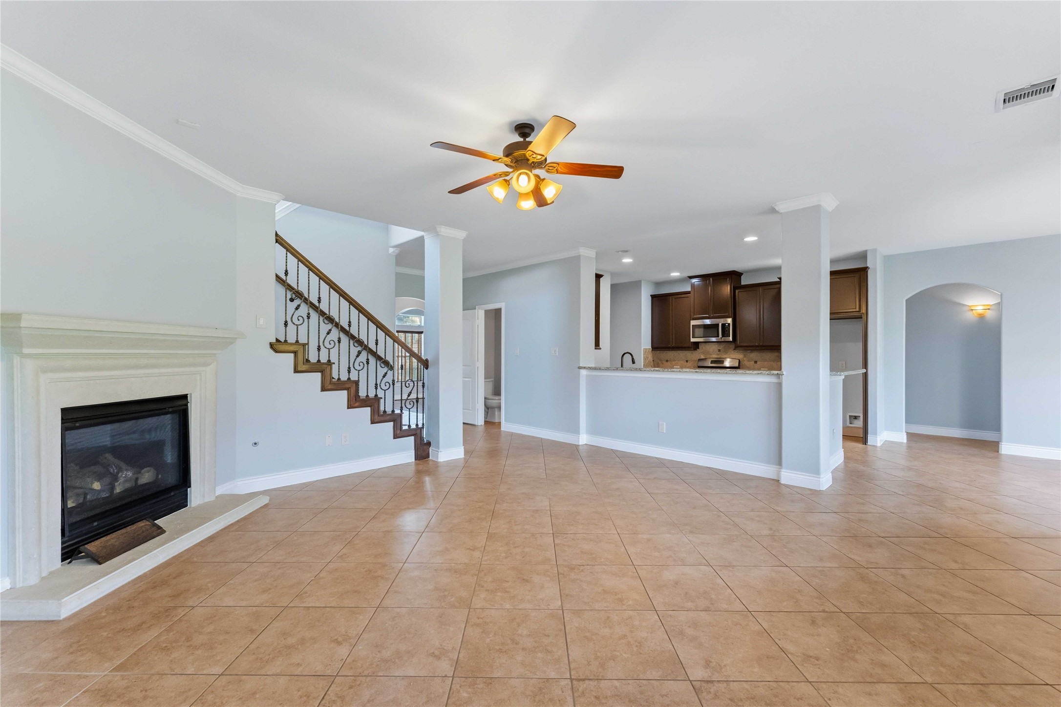 25327 Oak Knot Drive Spring, TX 77389 - Photo 6 of 32 a view of an empty room with a fireplace and window