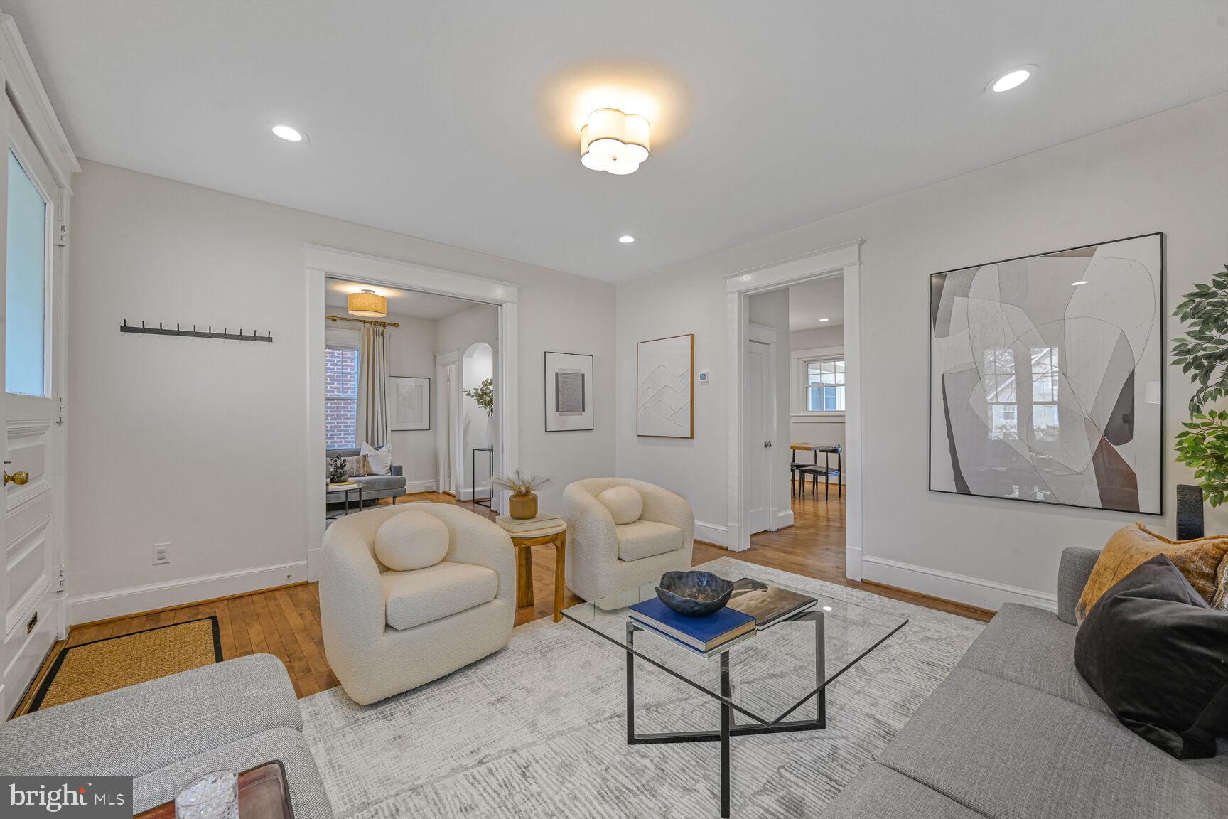 3410 Morrison Street Northwest Washington, DC 20015 - Photo 10 of 71 a living room with furniture and a lamp