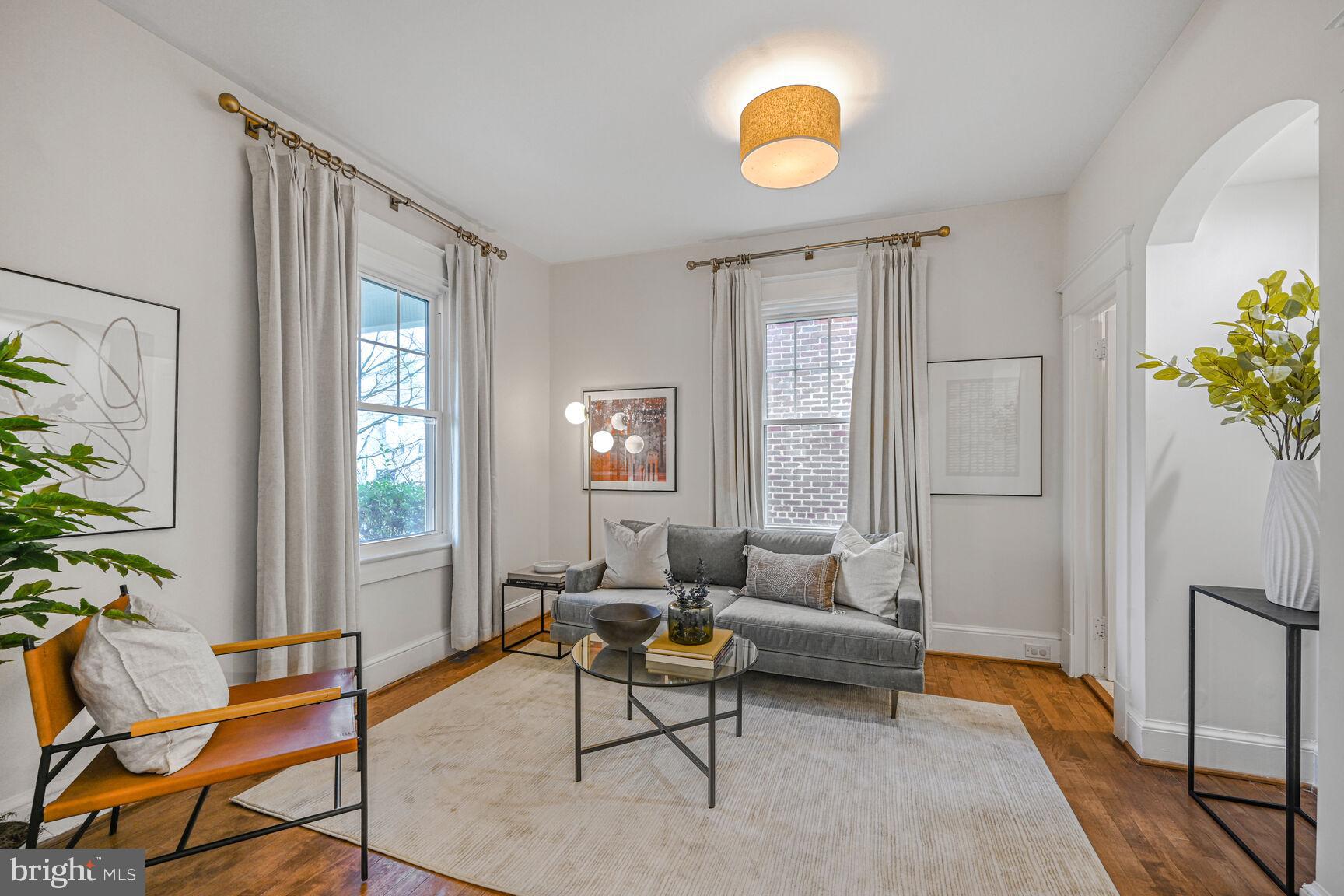 3410 Morrison Street Northwest Washington, DC 20015 - Photo 11 of 71 a living room with patio furniture and a potted plant