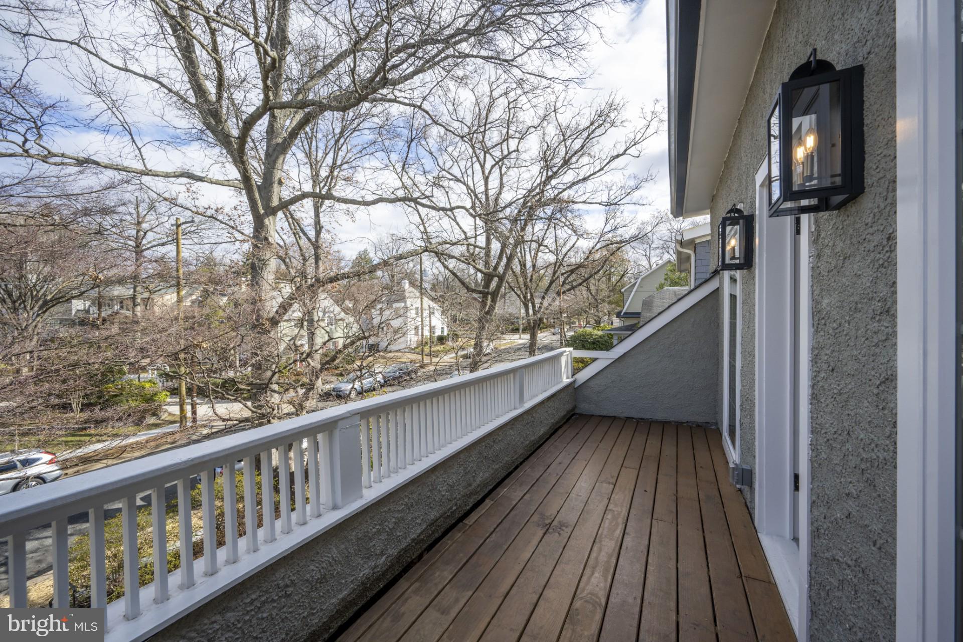3410 Morrison Street Northwest Washington, DC 20015 - Photo 27 of 71 a view of balcony with wooden floor and fence