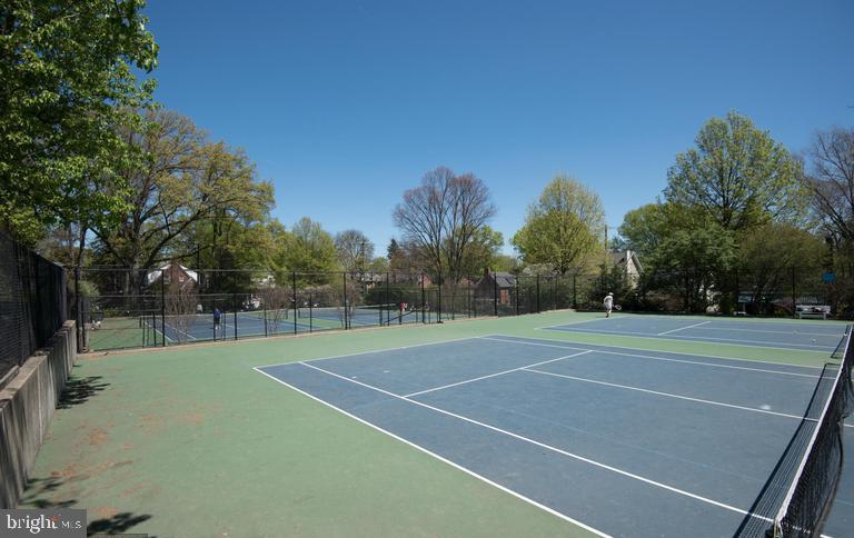 3410 Morrison Street Northwest Washington, DC 20015 - Photo 67 of 71 a view of tennis court with trees in the background