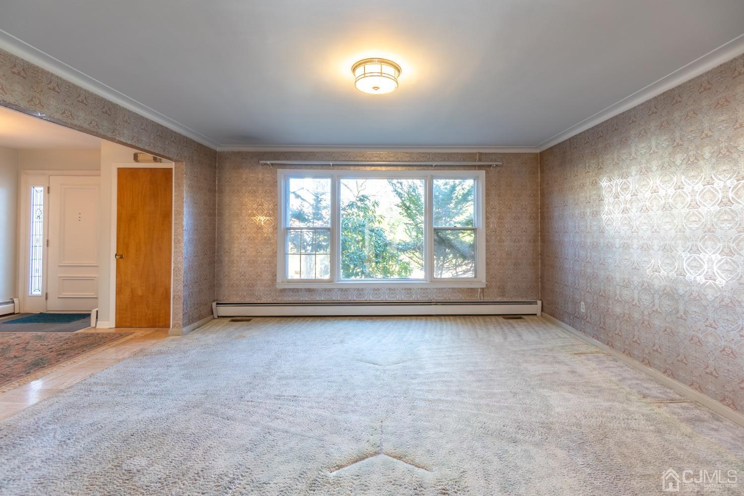 80 Sherwood Road Colonia, NJ 07067 - Photo 11 of 51 an empty room with windows