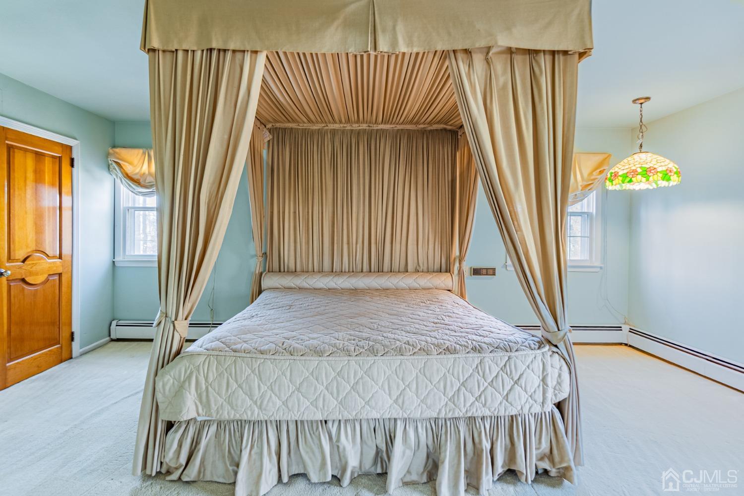80 Sherwood Road Colonia, NJ 07067 - Photo 27 of 51 a bedroom with a bed and a window