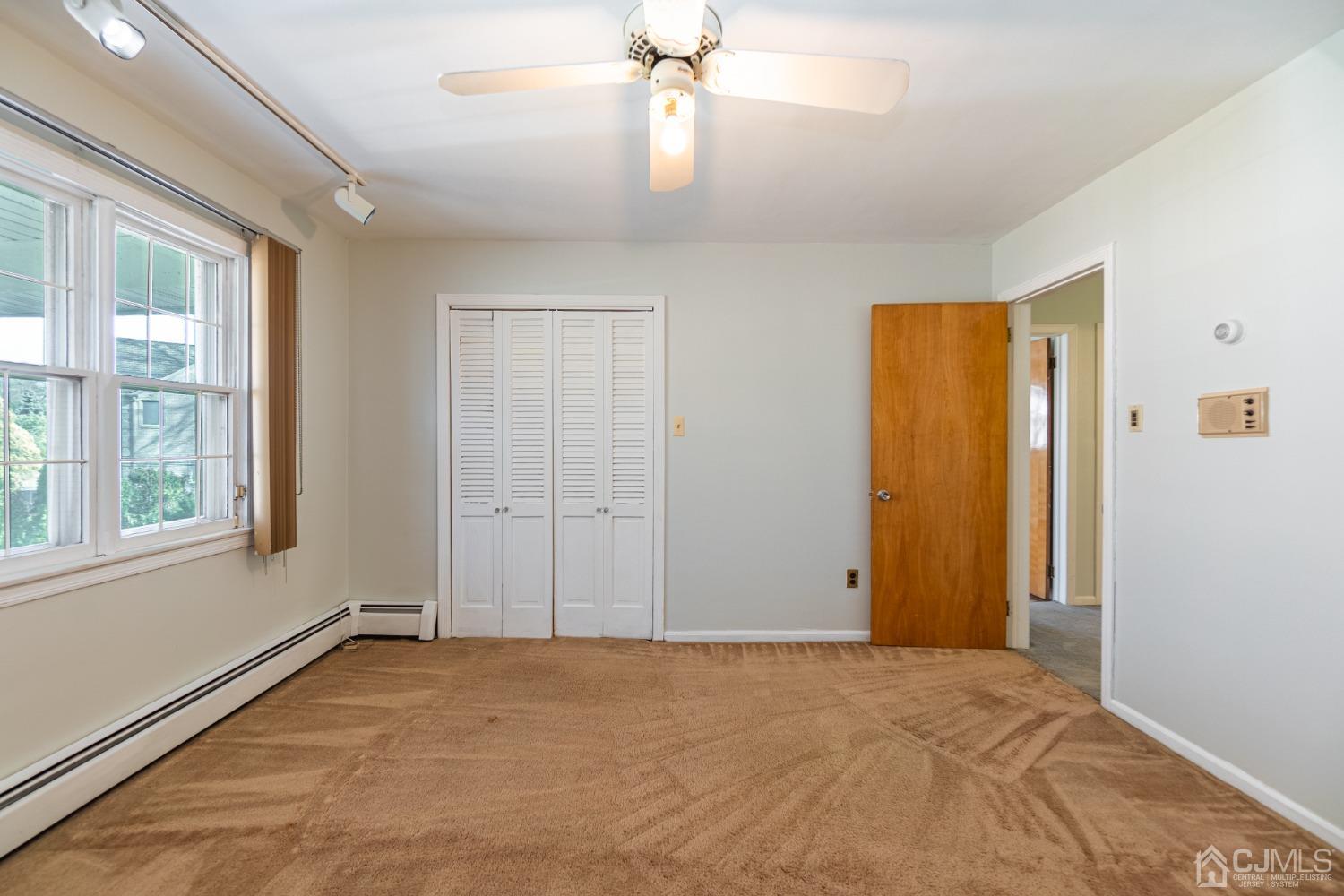 80 Sherwood Road Colonia, NJ 07067 - Photo 34 of 51 a view of an empty room with a window