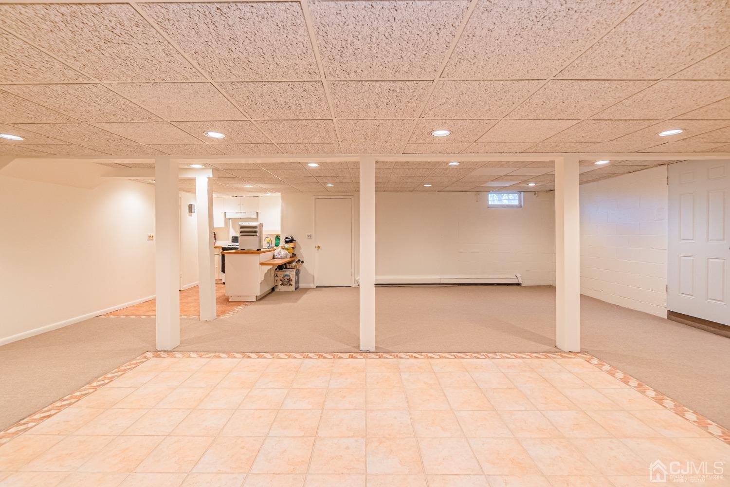 80 Sherwood Road Colonia, NJ 07067 - Photo 50 of 51 a view of a hallway with a glass door