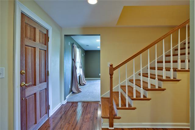 1030 North Sumner Road Portland, TN 37148 - Photo 5 of 20 A new hardwood staircase greets you upon entering.
