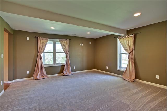 1030 North Sumner Road Portland, TN 37148 - Photo 7 of 20 The formal living room with new carpeting, recessed lighting, new dry wall, and fresh paint.