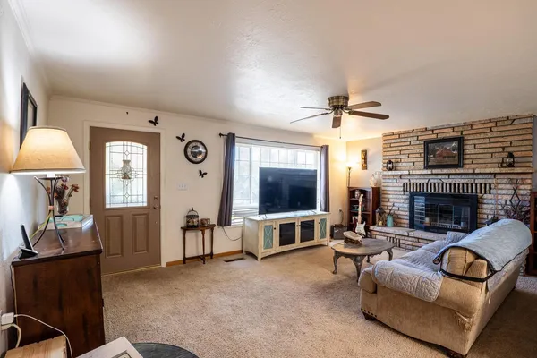 a room with furniture and flat screen tv