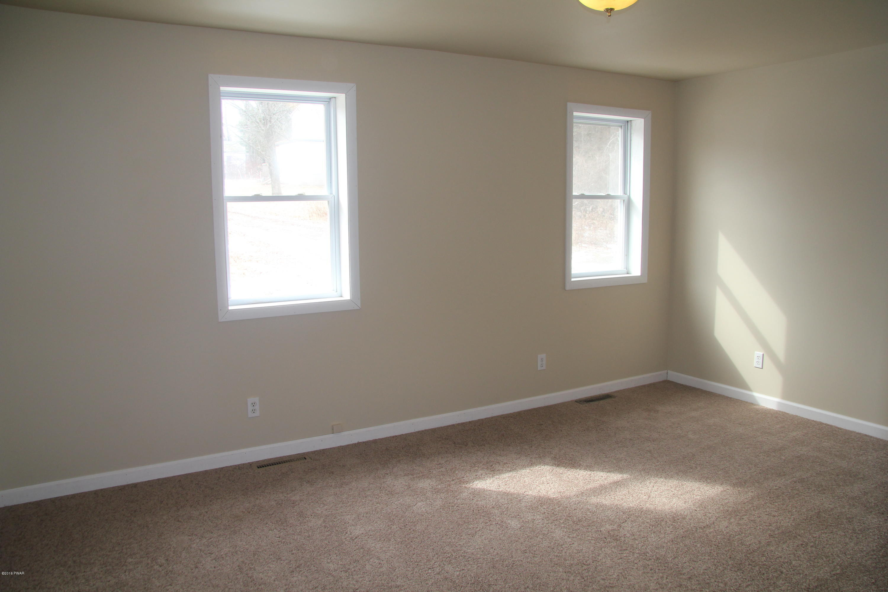 170 Swetz Road Lake Ariel, PA 18436 - Photo 6 of 16 an empty room with a window