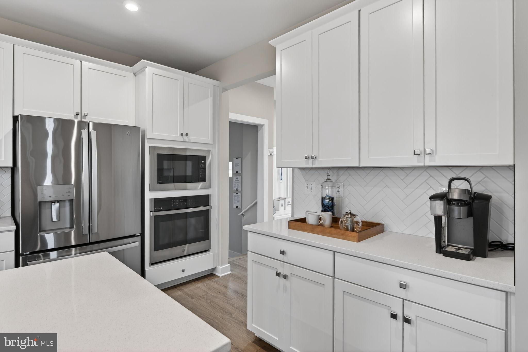 3575 Wildview Lane York, PA 17404 - Photo 15 of 62 a kitchen with stainless steel appliances a refrigerator sink and cabinets