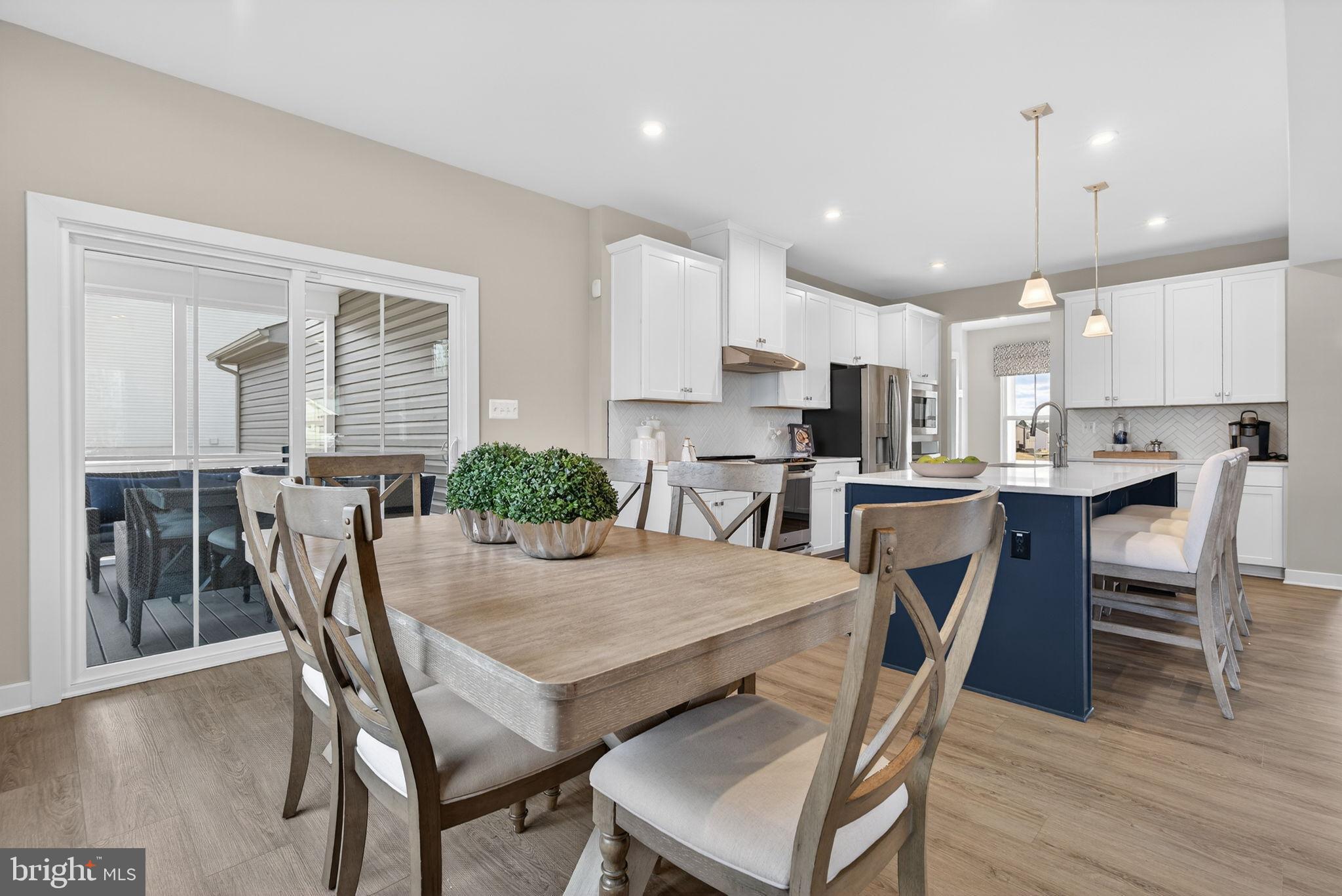 3575 Wildview Lane York, PA 17404 - Photo 17 of 62 a view of a dining room with furniture and wooden floor
