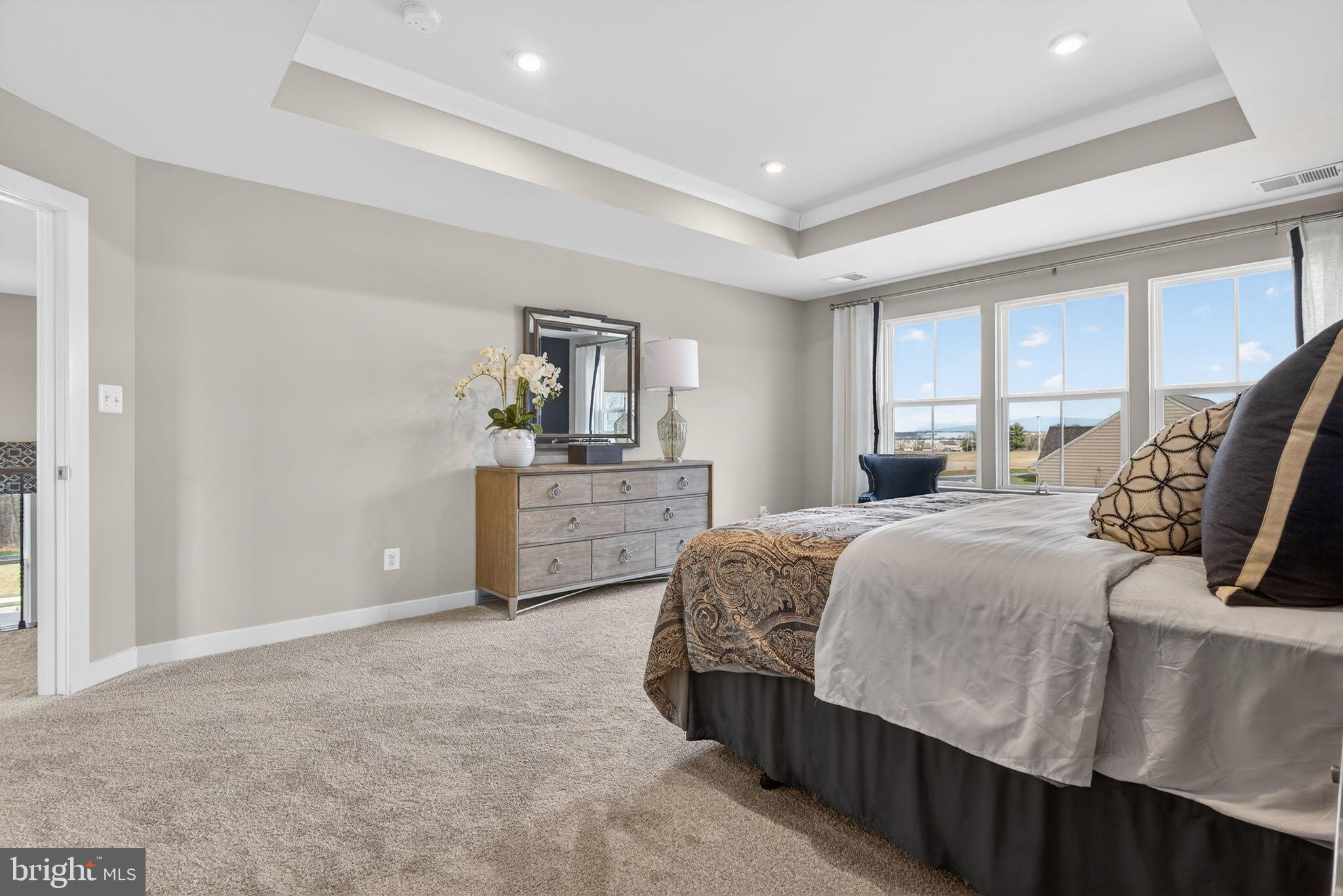 3575 Wildview Lane York, PA 17404 - Photo 32 of 62 Spacious bedroom with natural light and elegance.