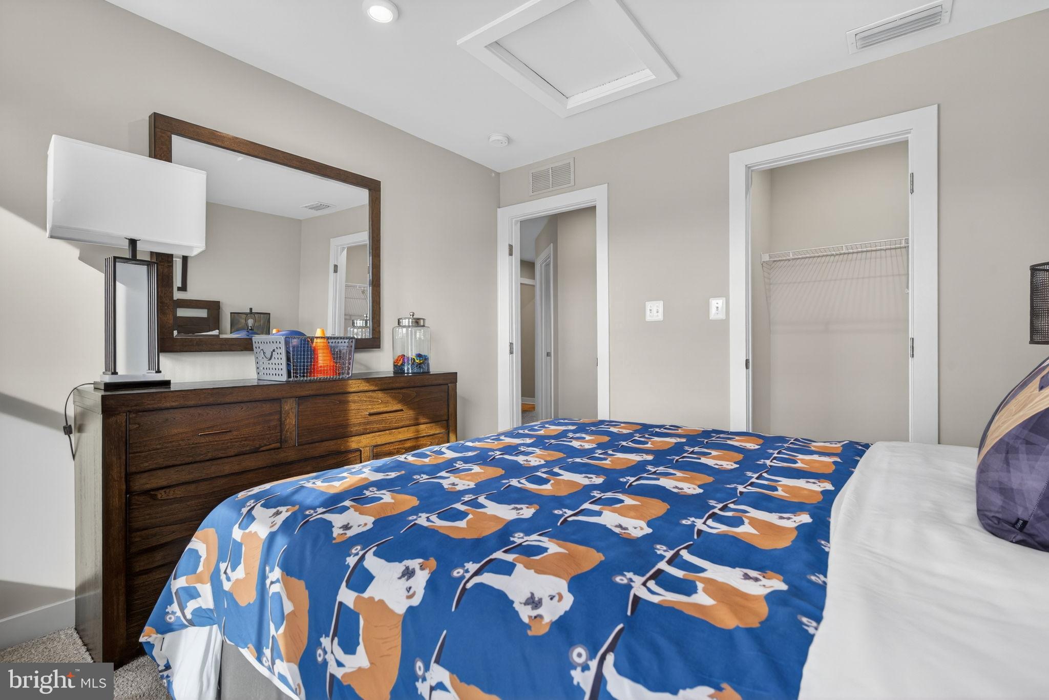 3575 Wildview Lane York, PA 17404 - Photo 43 of 62 a bedroom with a bed and a lamp on dresser