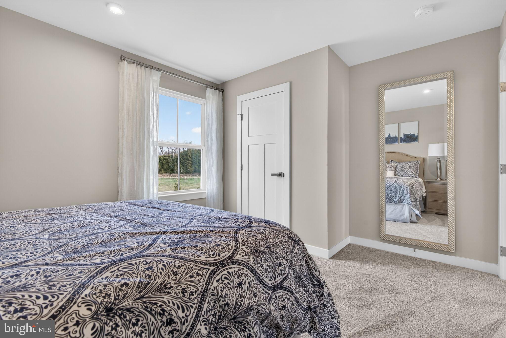 3575 Wildview Lane York, PA 17404 - Photo 47 of 62 a bedroom with a bed and a window