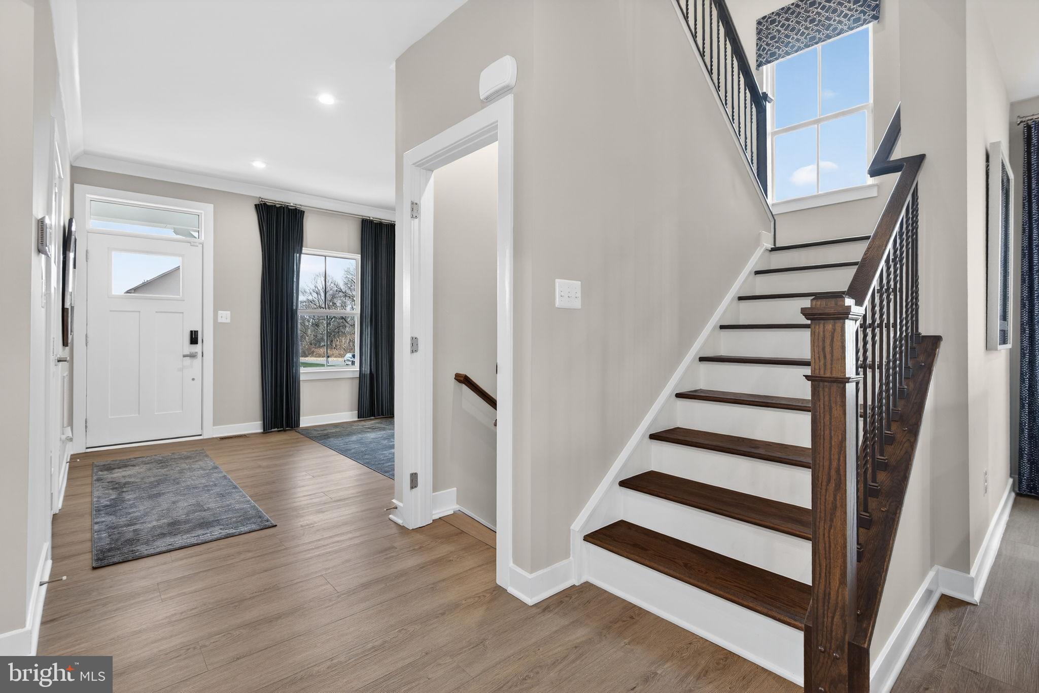 3575 Wildview Lane York, PA 17404 - Photo 6 of 62 a view of a hallway with wooden floor and entryway