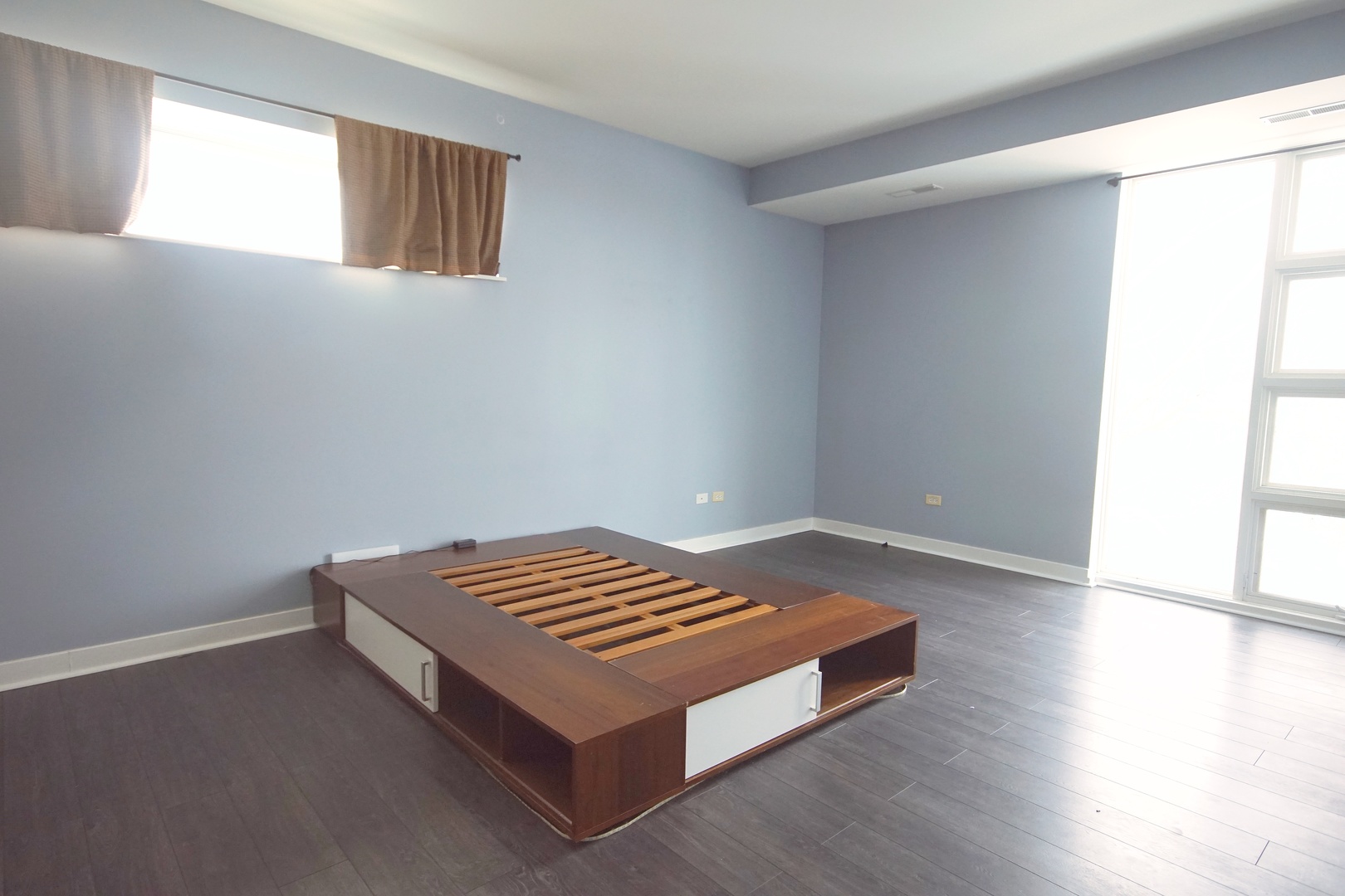 1905 South Wolf Road, Unit 401 Hillside, IL 60162 - Photo 12 of 22 a room with a bed and a window