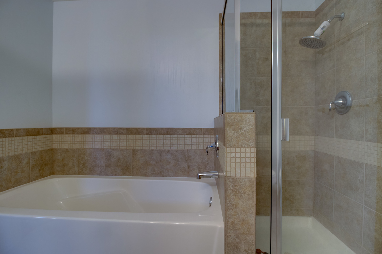 1905 South Wolf Road, Unit 401 Hillside, IL 60162 - Photo 15 of 22 a bath tub sitting next to a shower