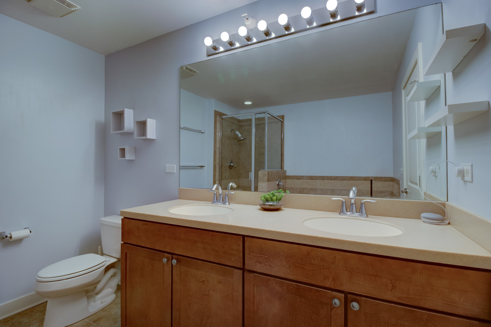 1905 South Wolf Road, Unit 401 Hillside, IL 60162 - Photo 17 of 22 a bathroom with a sink and a toilet