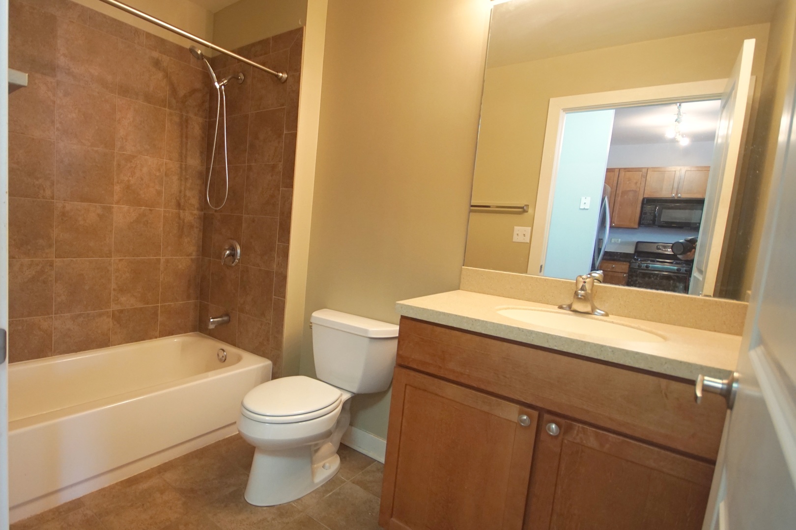 1905 South Wolf Road, Unit 401 Hillside, IL 60162 - Photo 20 of 22 a bathroom with a sink a toilet and shower